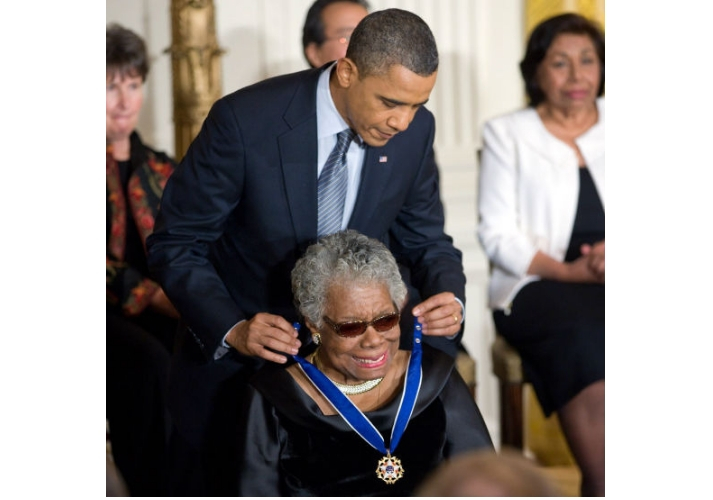 Maya Angelou receiving Presidential Medal of Freedom from President Obama