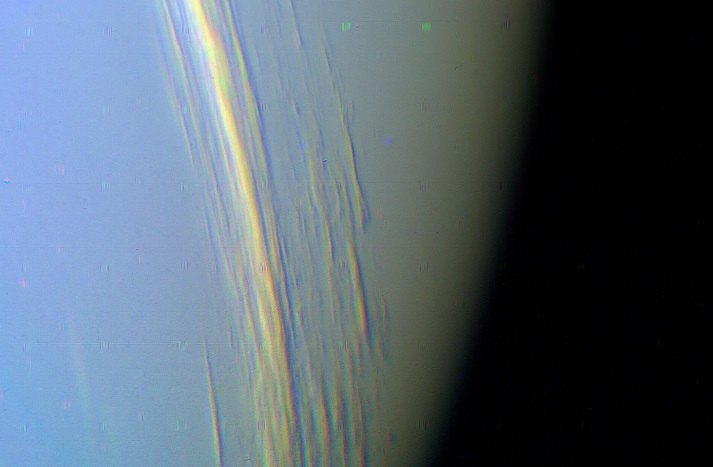 Cloudtops on Neptune, as imaged by Voyager II in 1989 using Orange, Green, and Violet filters.