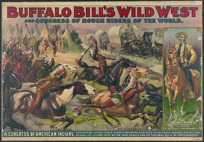 Circus poster showing Native Americans leading an attack against pioneers in covered wagons, with a portrait of Buffalo Bill on horseback.