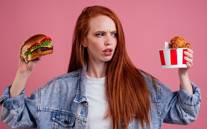 girl with a burger and chicken