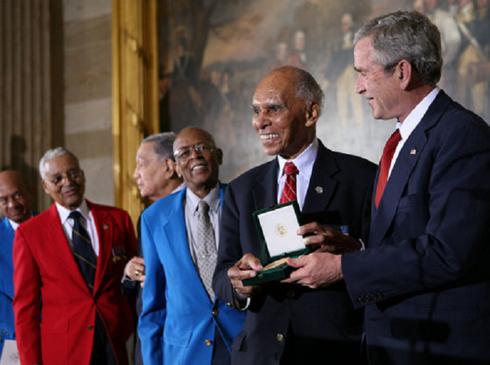 U.S. President George W. Bush presents the Congressional Gold Medal to the Tuskegee Airmen on Thursday, March 29, 2007, at the U.S. Capitol.