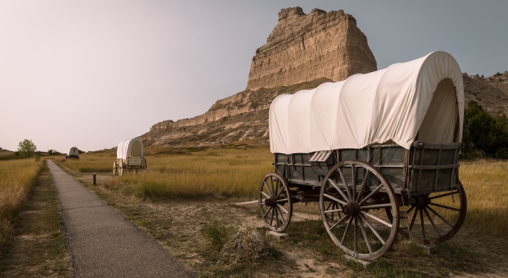 covered wagons heading west