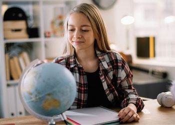 girl studying geography