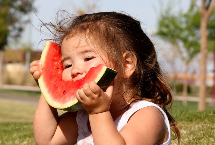 girl eating watermelon