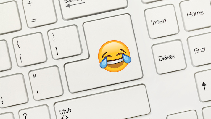 laughing emoji on keyboard