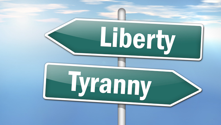 liberty or tyranny road sign