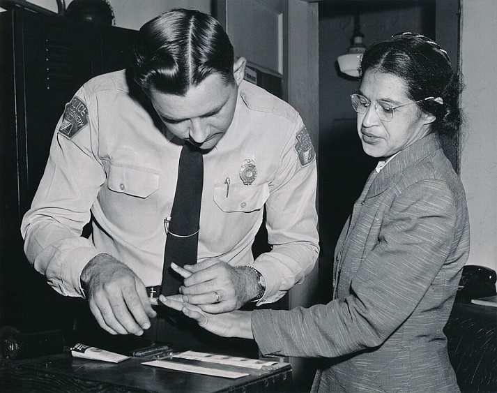 Rosa Parks being arrested and fingerprinted
