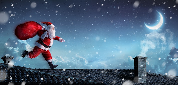 Santa running across rooftops