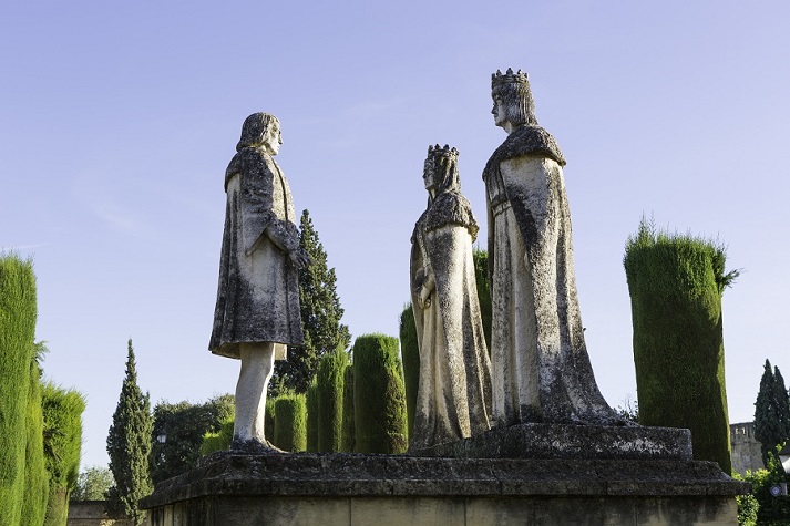 statues of Ferdinand and Isabella with Christopher Columbus in the Cordoba