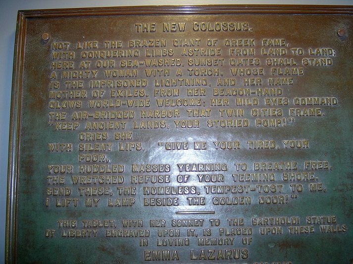 plaque of The New Colossus poem by Emma Lazarus at The Statue of Liberty