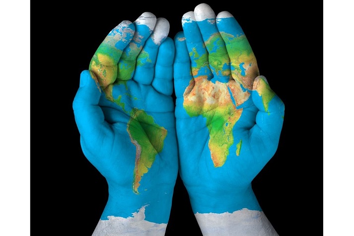 world painted on open hands
